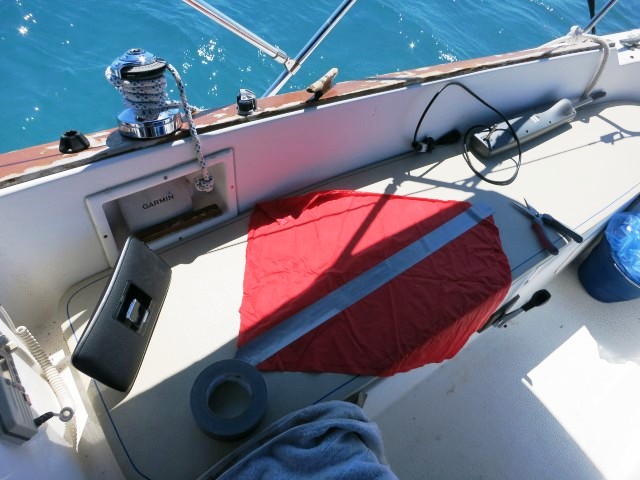 Making a Diver Down flag from duct tape and a rain pancho.
