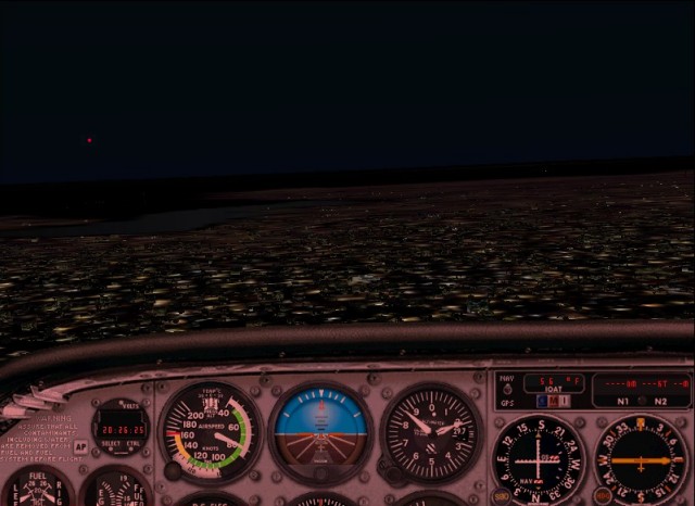 Red light hovering over Lake Arlington at my 11 o'clock position.
